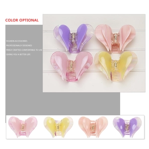 Elegant butterfly-shaped acetate hair claws in four colors for French aesthetic style
