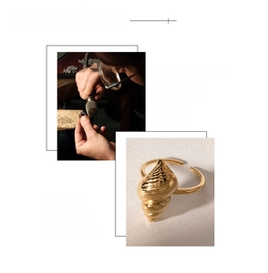 Detail of 18K gold-plated stainless steel ring with ocean shell texture and engraving