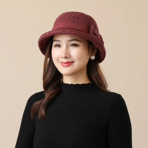 Women's burgundy dome cloche hat with black houndstooth pattern and ribbon bow