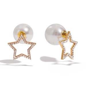 Gold star-shaped earrings with clear crystals and a large white round pearl backing