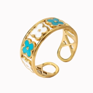 Close-up of 18k gold-plated open ring with blue and white clover enamel details