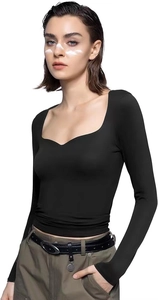 Detail of a slim fit square neck long sleeve crop top in black smooth fabric