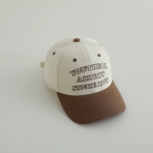 Detail showing two-tone baseball cap with YOUTHEOL ALWAYS SINCE 1988 embroidery