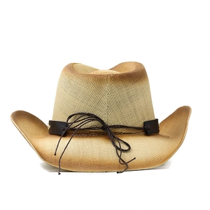 Gradient brown straw cowboy hat with leather band and curved brim on white background