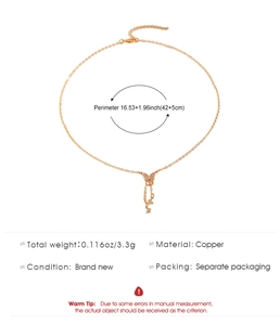 Detail view of copper butterfly necklace with tassel pendants and size specifications