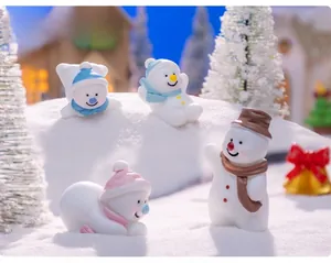 Miniature Christmas snowmen figurines in different poses for DIY holiday micro landscapes