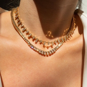 Double-layered gold Y-necklace with baguette-cut zircon crystals for elegant party wear