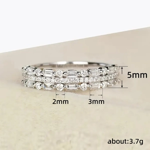 Minimalist multi-layer sparkling zircon ring featuring round and rectangular stones in silver