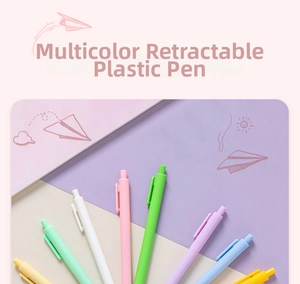 Macro detail showing a set of macaron-colored retractable plastic pens with convenient clips