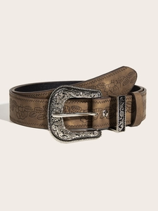 Vintage brown leather belt with floral embossing and ornate engraved silver metal buckle