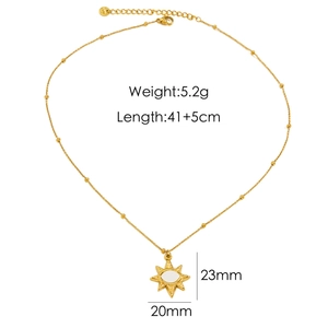 Gold starburst sun pendant necklace with white shell center and product dimensions