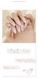 Detail of pink floral press-on nails with 3D pearls, silver chains and 24-piece set layout