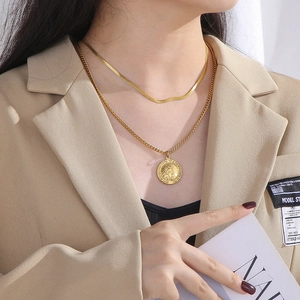 Double-layered gold titanium steel necklace featuring Virgin Mary pendant for women