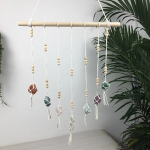 Handmade Bohemian crystal wall hanging with natural raw stones and cotton fringe