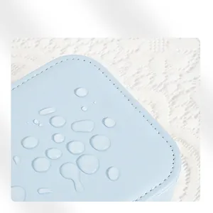 Waterproof blue PU leather jewelry box showing fine stitching and moisture protection