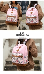 Detail views of pink floral canvas backpack with durable brown base and front pocket