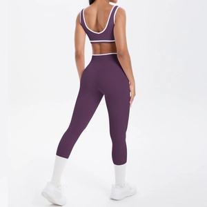 Damen Sportset in Dunkelviolett mit weißen Kontraststreifen und Crossover-Design Rückenansicht