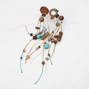 Handmade bohemian tassel earrings with natural stone beads and colorful wood accents