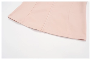 Detail of pink sports jacket featuring premium stitching and smooth zipper closure