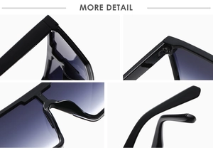 Detail view of square oversized sunglasses with metal hinges and black gradient lenses