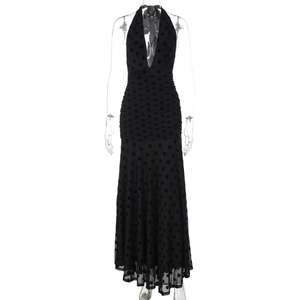 Detail of sexy deep V-neck and halter polka dot mesh maxi dress with waist pleats