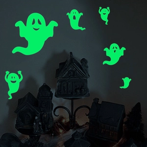 Luminous Halloween wall stickers featuring green glowing ghosts and dark haunted houses