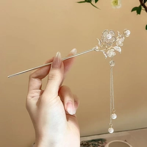 Elegant gold metal hair stick with white magnolia flower, pearls and long tassels