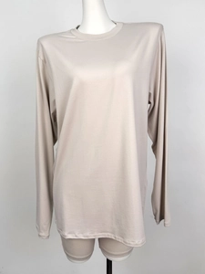 Minimalist beige long sleeve T-shirt and shorts lounge set in soft stretch fabric