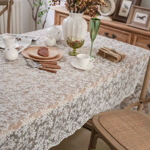 Elegant white lace tablecloth with floral embroidery for photography backdrop and home decor