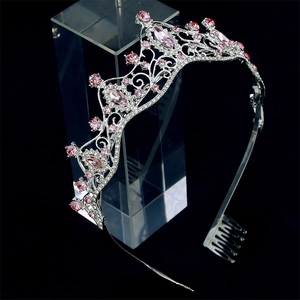 Detailed macro view of silver bridal crown with pink and clear crystal rhinestones