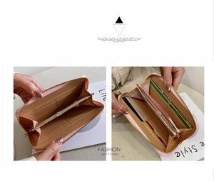 Internal layout of pink leather long wallet featuring multiple card slots and coin pocket