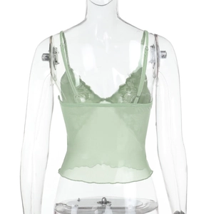 Detail of light green lace mesh camisole featuring delicate floral patterns on the back
