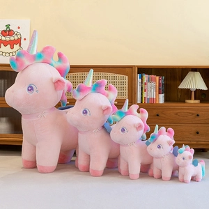 Plush rainbow unicorn toy set in five sizes with pink fur and colorful mane