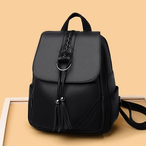 Women's black soft leather backpack with lychee texture and stylish tassel detail