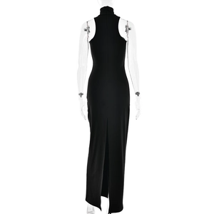 Rear view of a black halter maxi dress featuring a sleek bodycon fit and center back slit