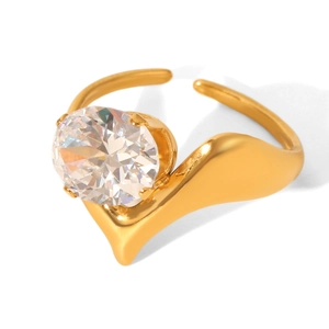 Detailed close-up of a gold-plated adjustable ring with a large claw-set round gemstone