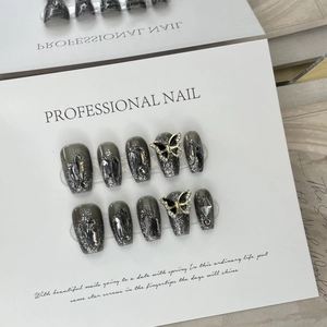 Handmade gunmetal butterfly press-on nails with dark rhinestones and glitter finish