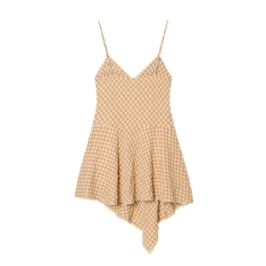 Fashionable beige plaid mini slip dress with lace details and asymmetric ruffled hem