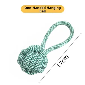 Detail of 17cm green and white woven rope ball toy for interactive dog play and chewing