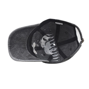 Detailed interior of washed cotton baseball cap showing sweatband and 100% cotton label