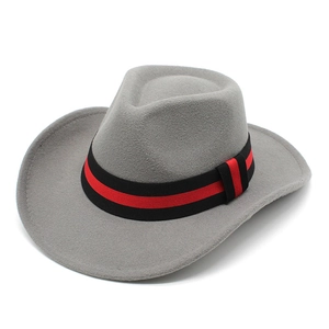 Detail of grey felt cowboy hat featuring a distinctive black and red striped ribbon band