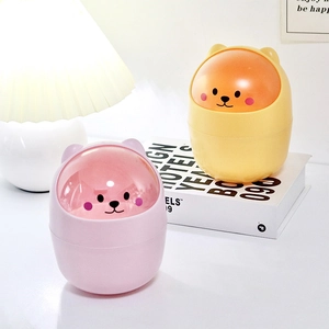 Mini cute animal desktop trash bins in pink and yellow with flip lids for office storage