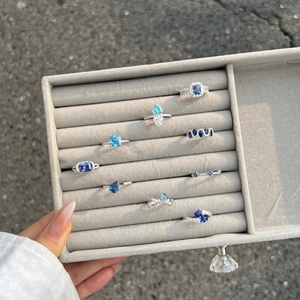 Elegant S925 silver rings with blue heart and teardrop zircon crystals in a velvet box