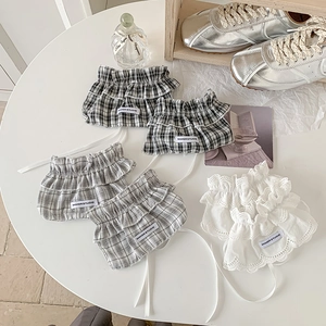 Lolita lace leg warmers with ruffle plaid design and white ribbon bow accents
