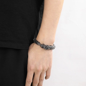 Macro detail of antique silver 304 stainless steel dragon bracelet with intricate scales
