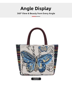 Front view of a jacquard fabric handbag with a blue butterfly pattern and ethnic stripes