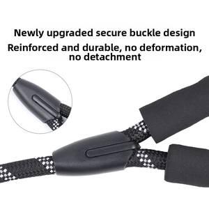 Detail showing reinforced connector buckle and foam padded handle of the dog leash