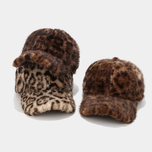 Thick leopard print faux fur baseball caps in brown and cream for winter warmth