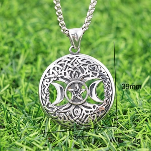 Detailed macro view of silver Celtic Tree of Life pendant with 35mm width and 39mm height