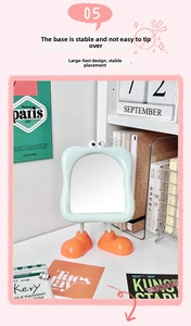 Detail of stable big feet stand design on a cute green cartoon desktop makeup mirror